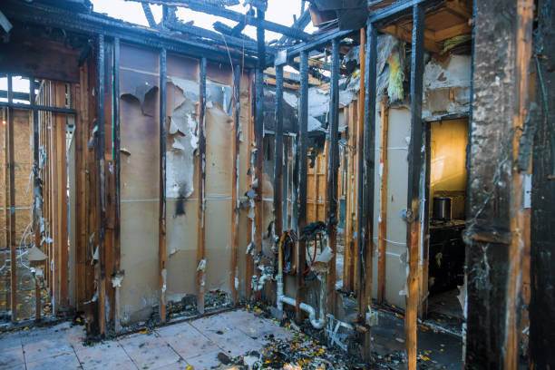 Professional Fire Damage Repair technician working in Whitinsville, MA